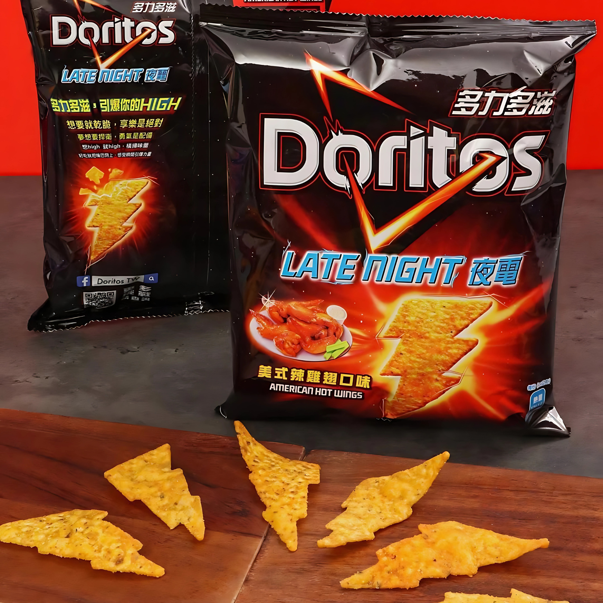Opened bag of American Hot Wing Doritos with lightning-shaped chips displayed on cutting board.