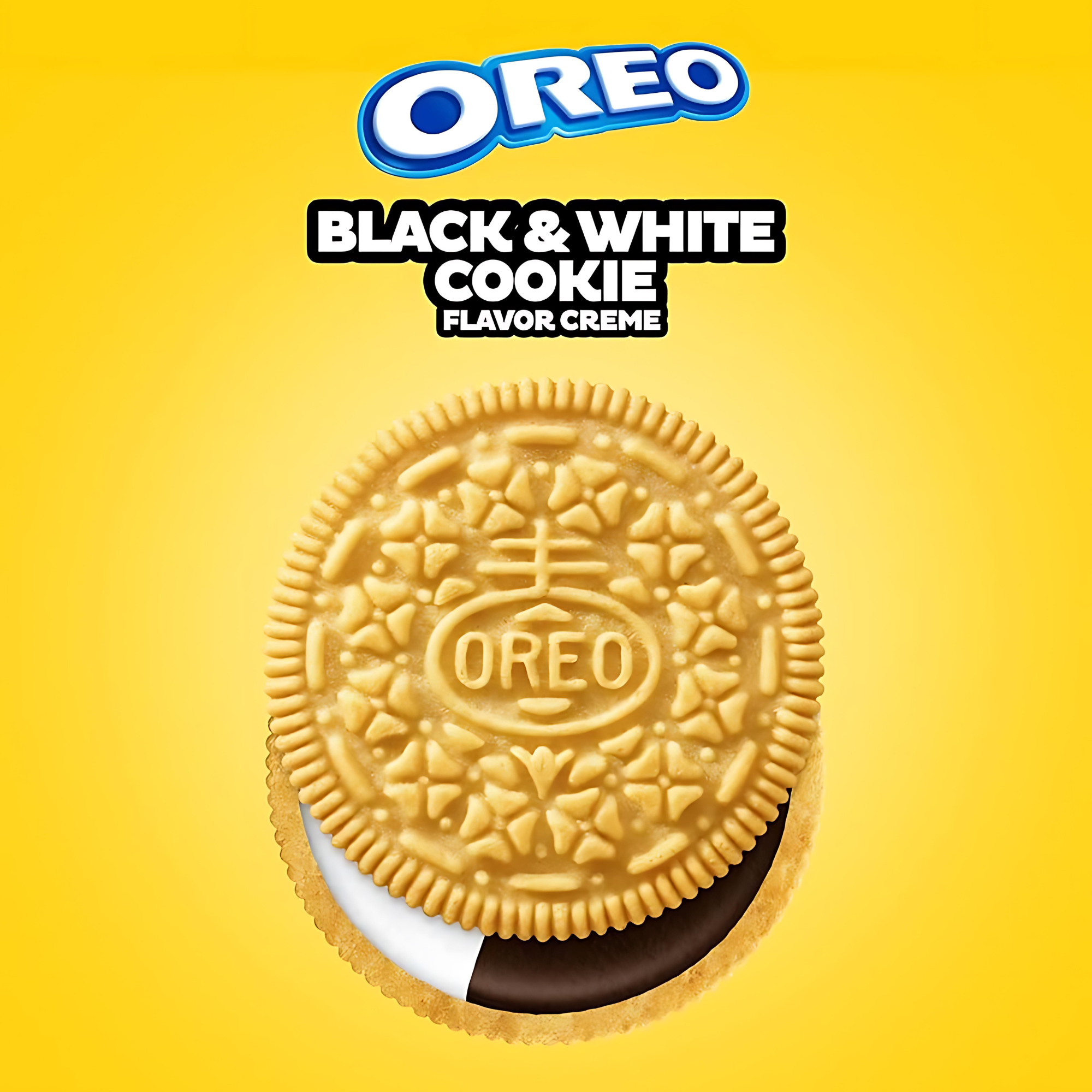 Close-up of Black & White Oreo cookie on yellow surface.