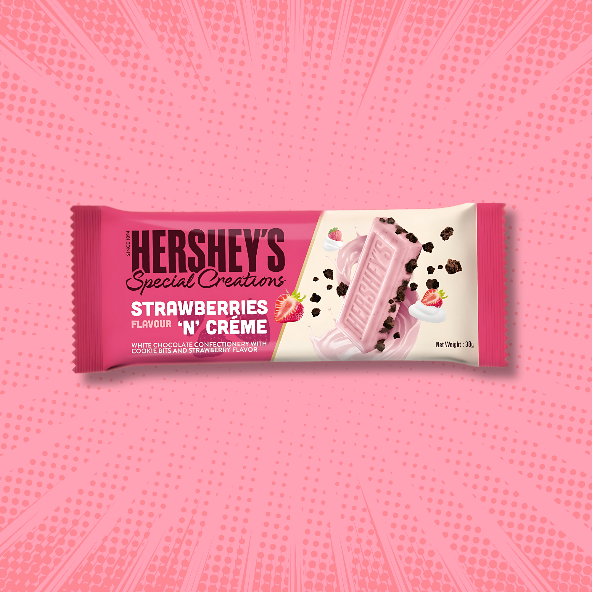 Pink packaging of Hershey's Strawberries 'n' Crème chocolate bar, featuring strawberries and cookie bits on a vibrant pink background.