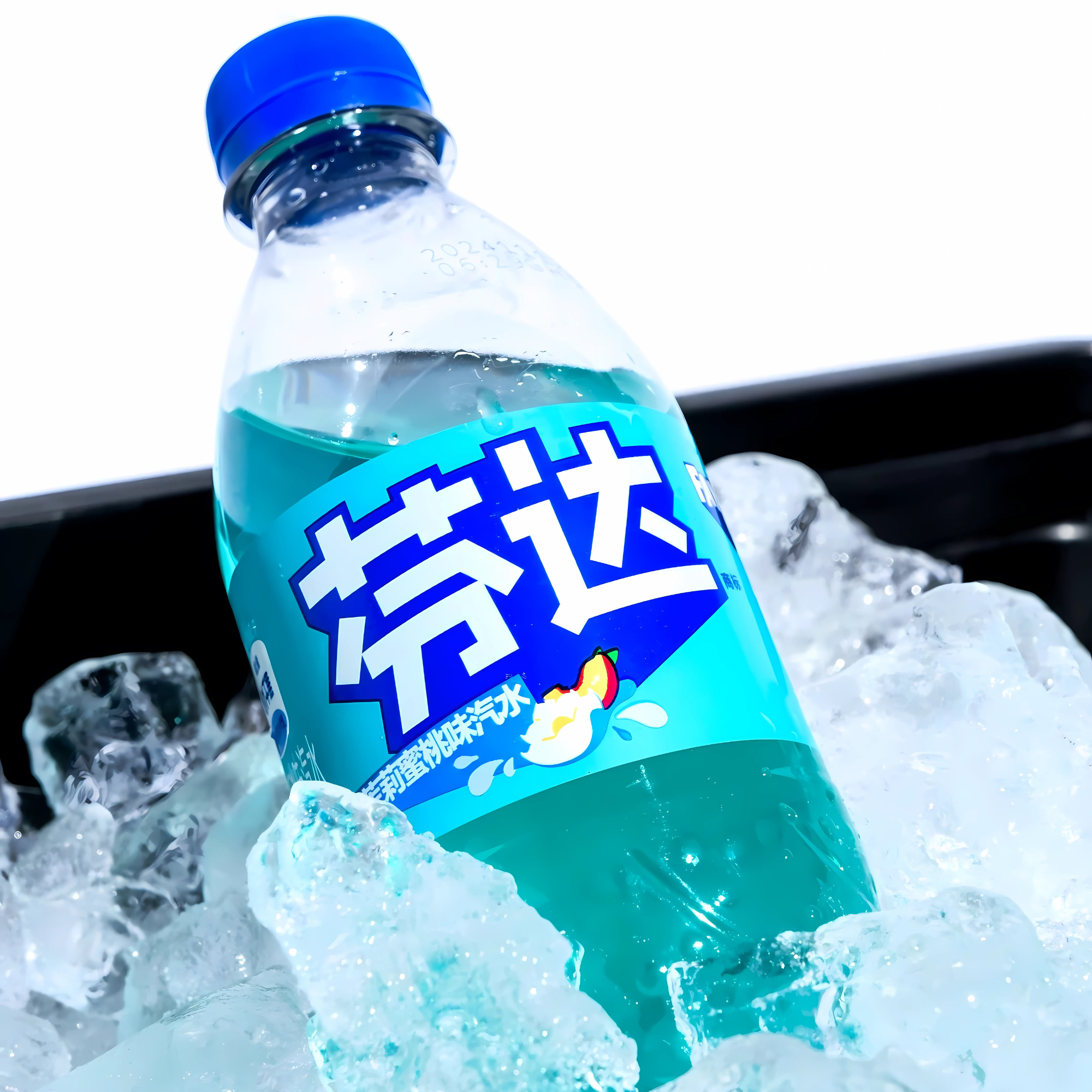 A blue-capped bottle of Jasmine Peach Fanta with a colorful blue label chilling on ice cubes. 