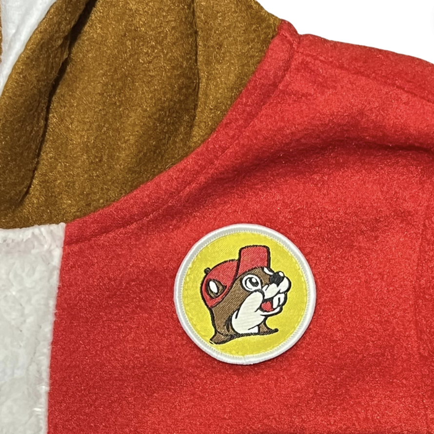 Buc-ee's Christmas Beaver Suit Detail with Closeup of Beaver Badge