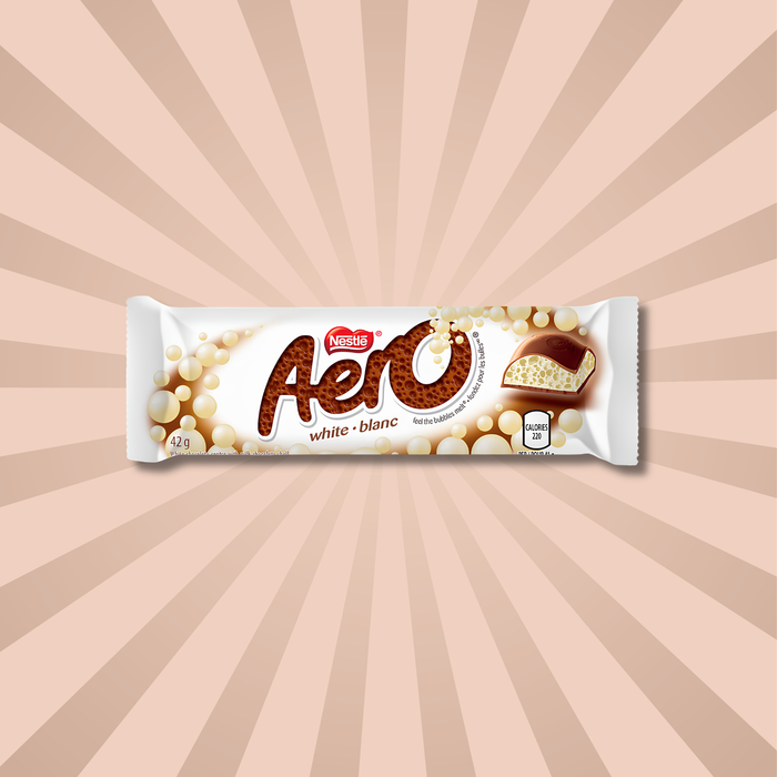 Pack of Aero White Chocolate from Canada against a creamy starburst background. Shop Canadian chocolate candy online.