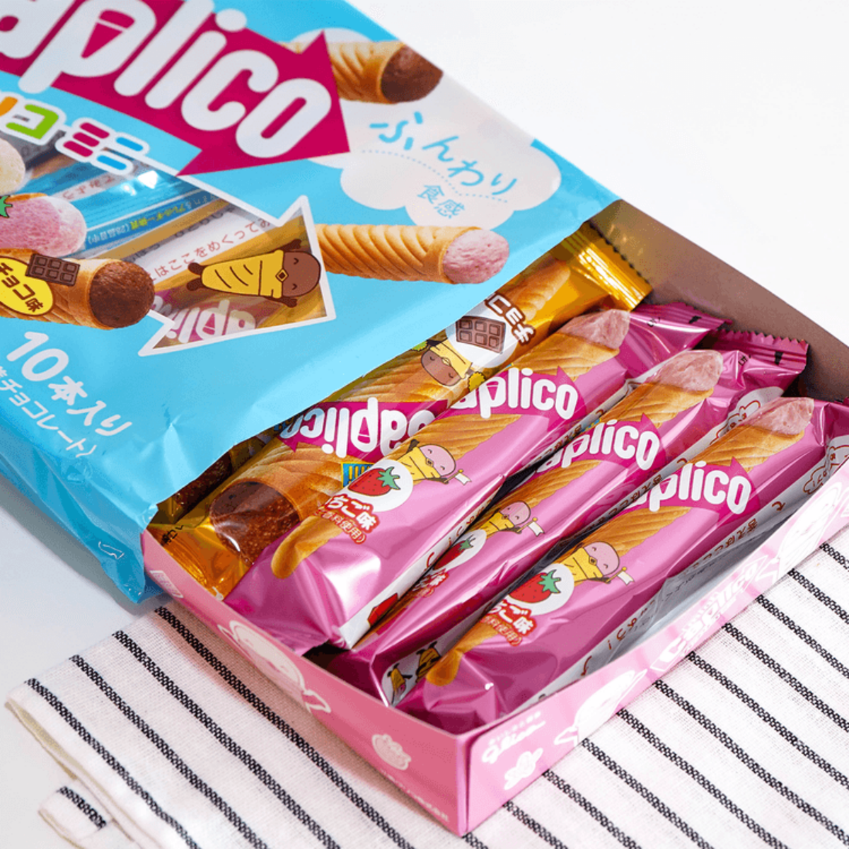 A pack of Japanese Caplico Mini ice cream wafer cones is open, revealing several wafer cones inside. Available to buy online.