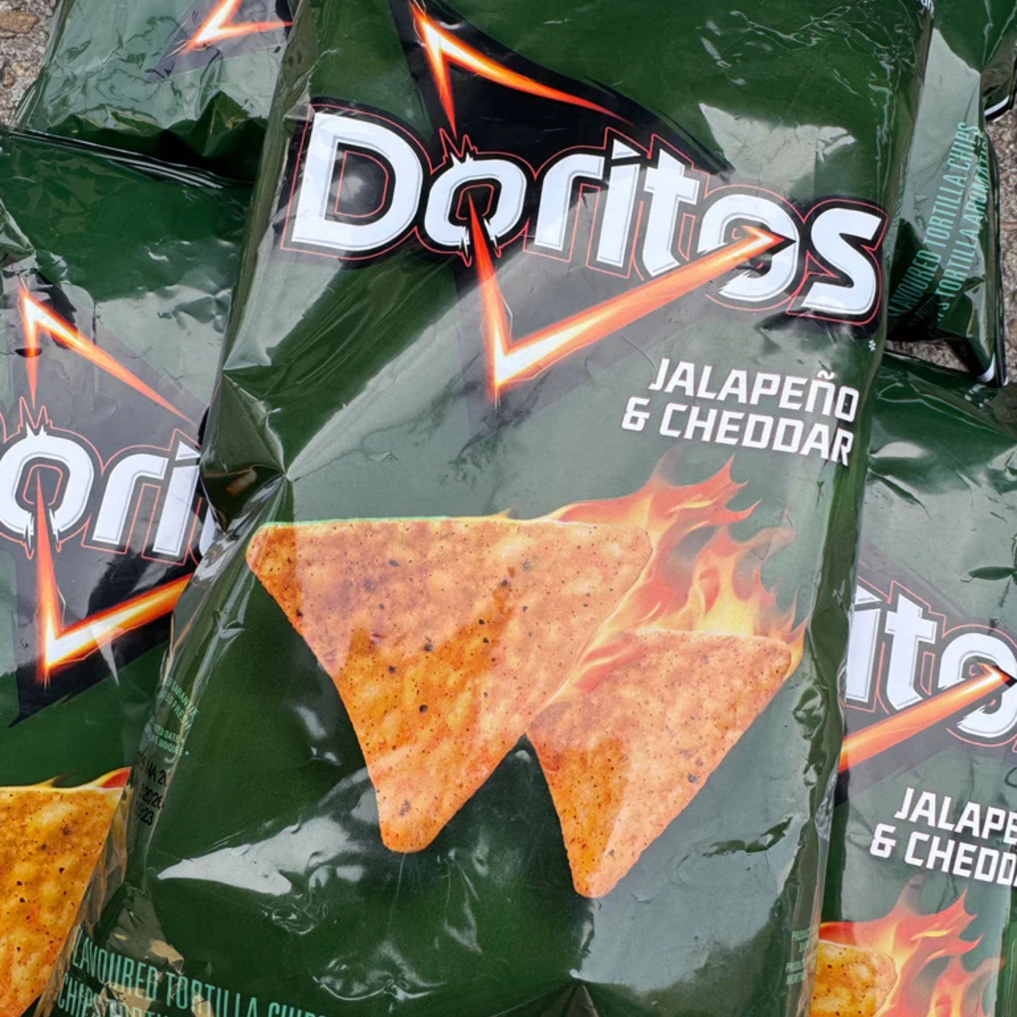Green bags of Doritos Jalapeño Cheddar from Canada. Shop Canadian chips online!