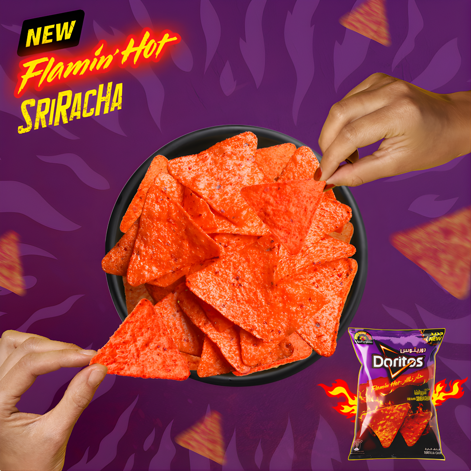 Close-up of bright red Doritos Screamin’ Sriracha tortilla chips in a bowl being picked up by hands