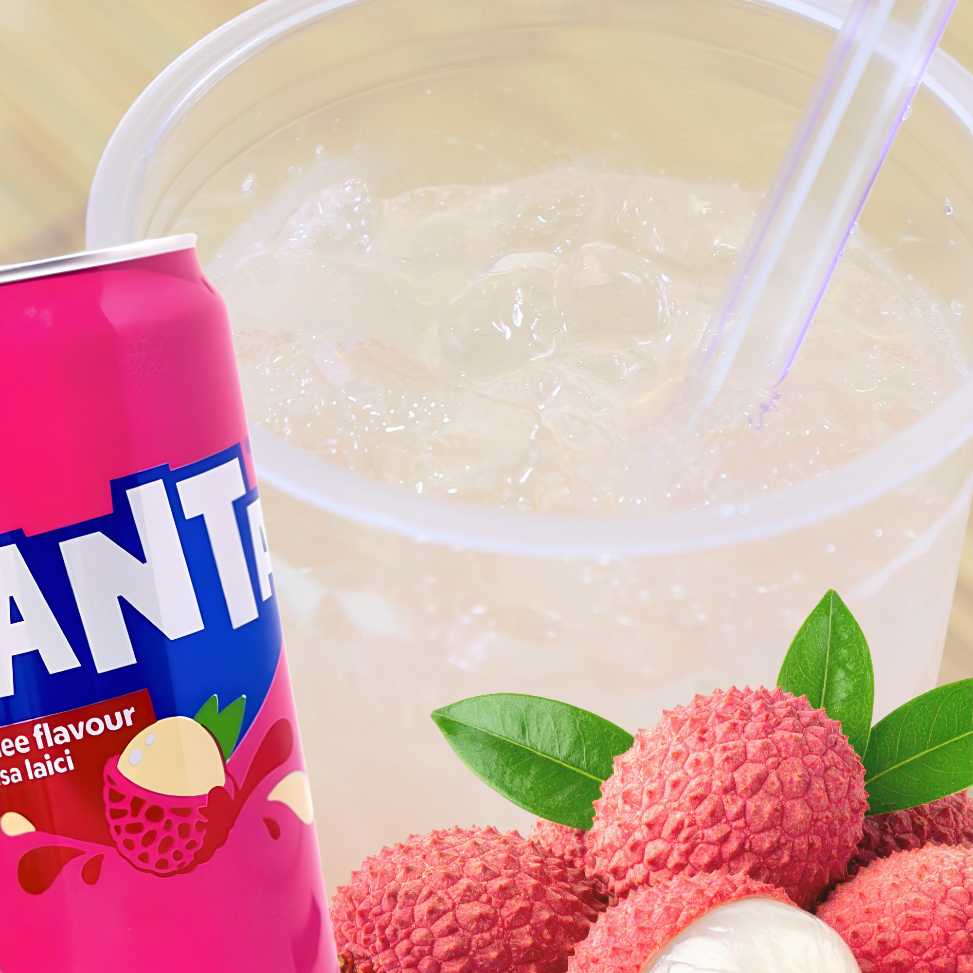 Bottle of Fanta Lychee from Malaysia featuring a glass of the soda and lychee fruits. Buy Malaysian drinks online.