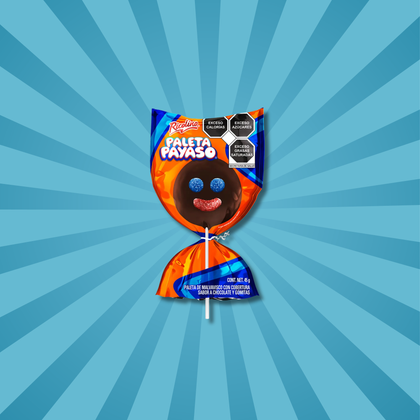 Paleta Payaso Mexican Lollipop candy wrapped in bright orange and blue packaging with a clown face, featuring blue eyes and a red mouth. Background has a blue starburst pattern. Available to buy online.