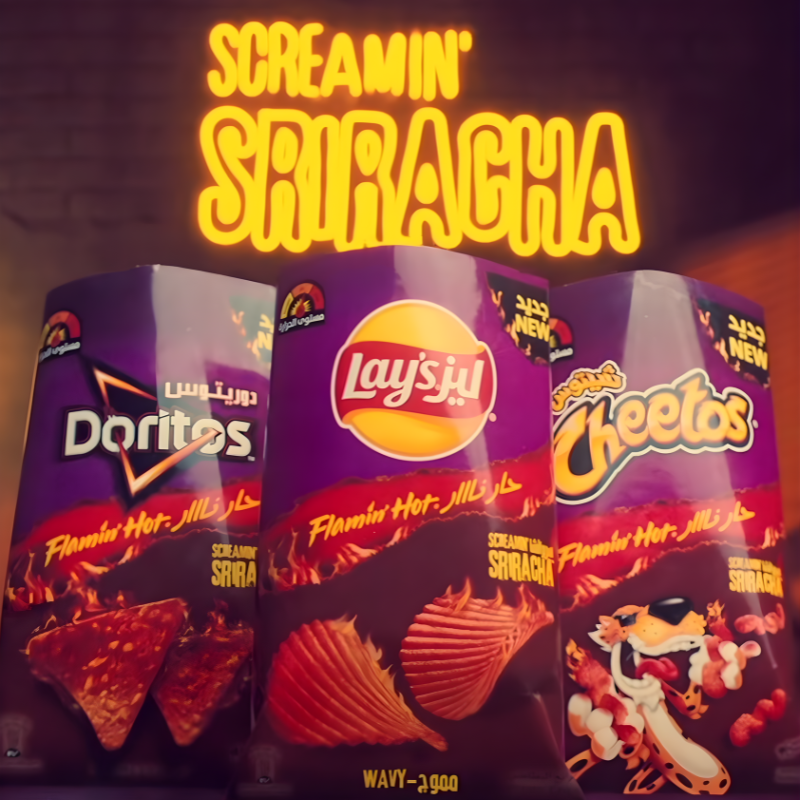 Screamin’ Sriracha snack lineup from Saudi Arabia featuring Lay’s, Doritos, and Cheetos Flamin’ Hot sriracha flavors