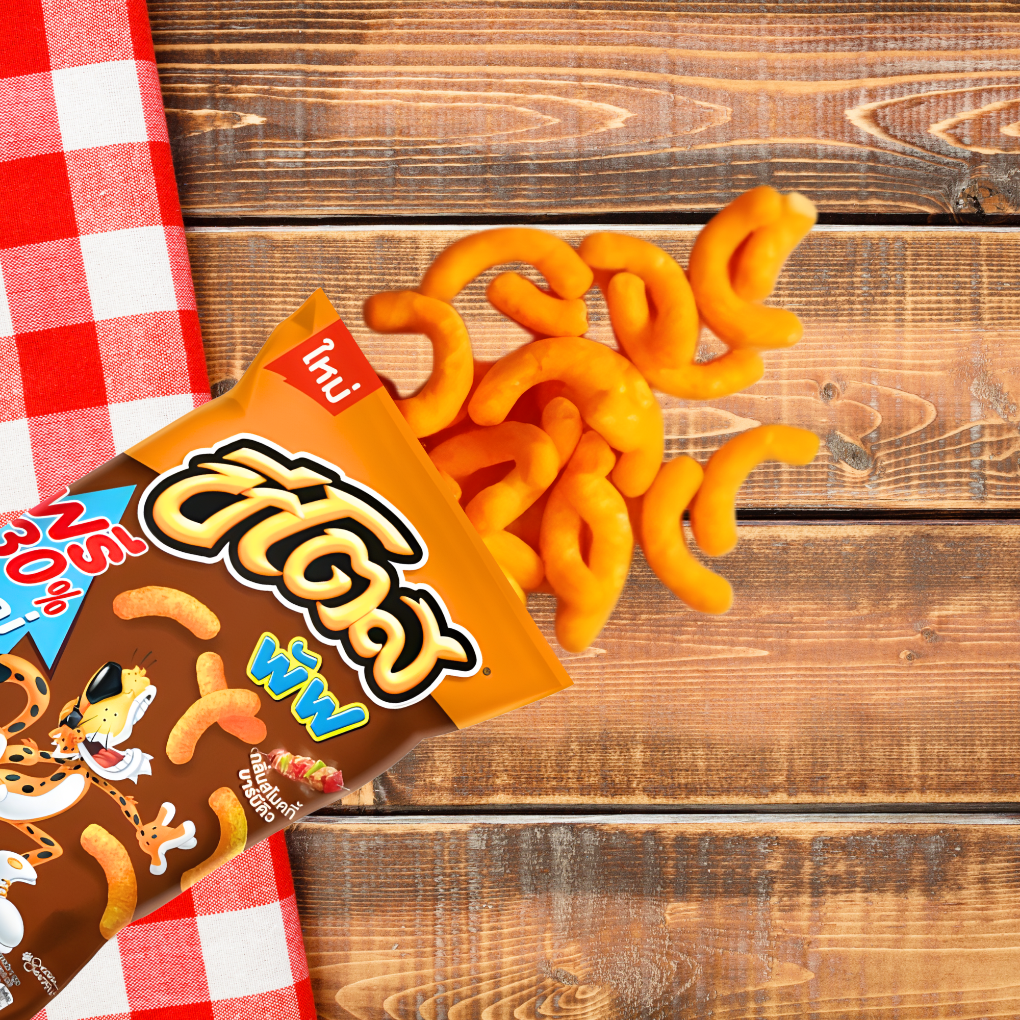 Bright packaging of Thai Smoky BBQ Kebab Cheetos featuring a playful cheetah character. Bold colors and spicy imagery, sits against a picnic tabletop, as the cheetos puffs spill out onto the table.